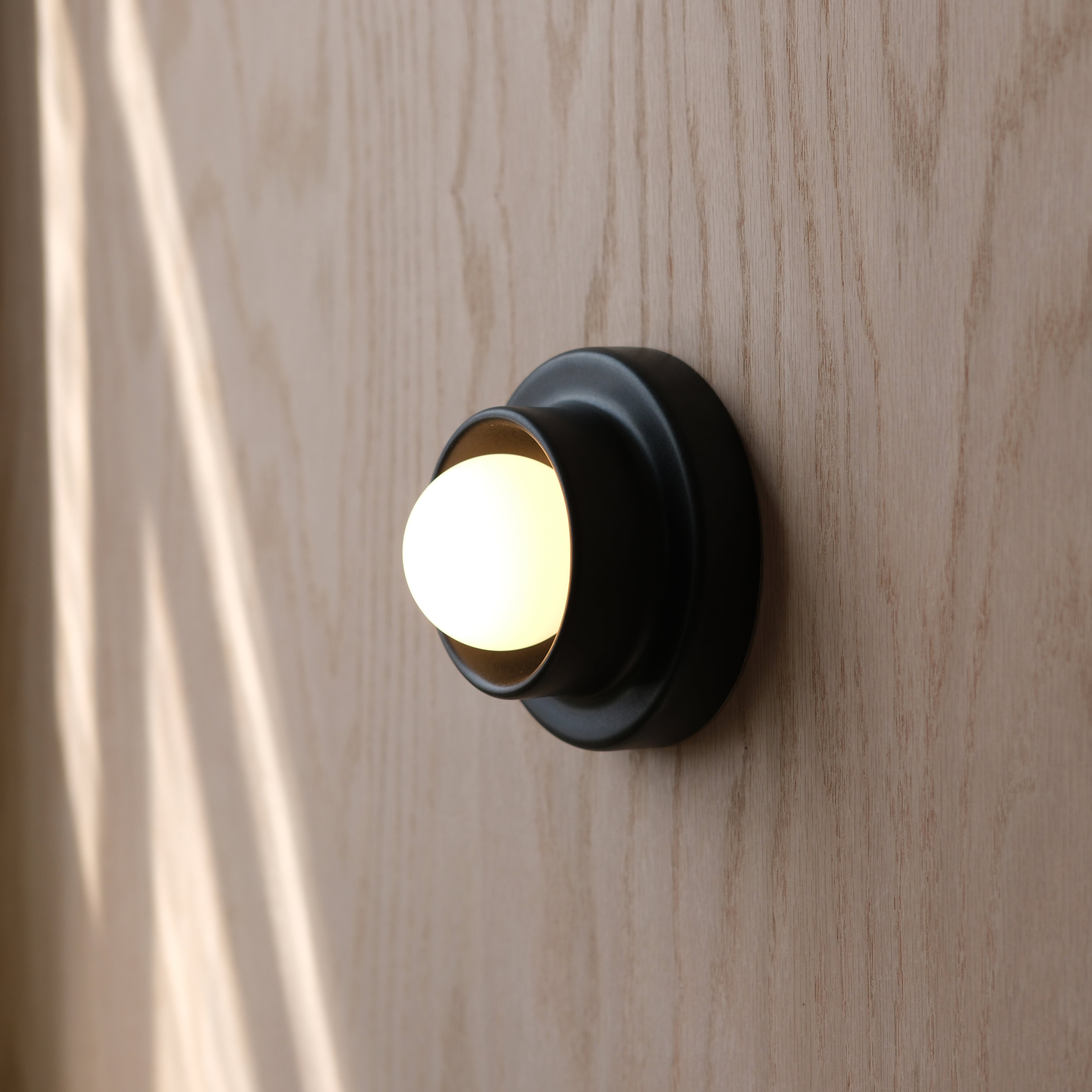Q/Sconce