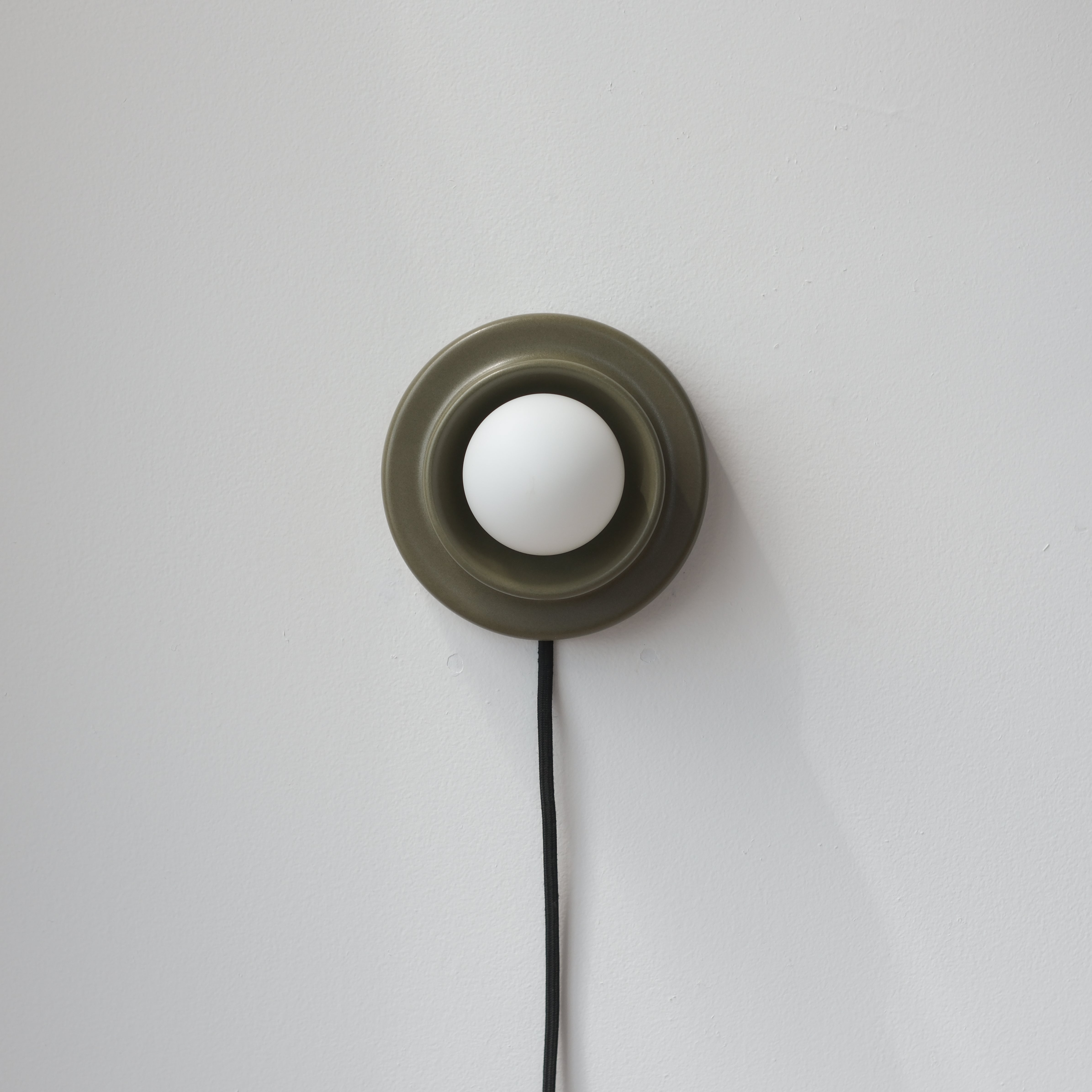 Q/Sconce